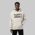 A light beige hoodie with a black graphic print on the chest reading 'SLATE above UNION' alongside geometric cube icons, displayed on a clean white background.